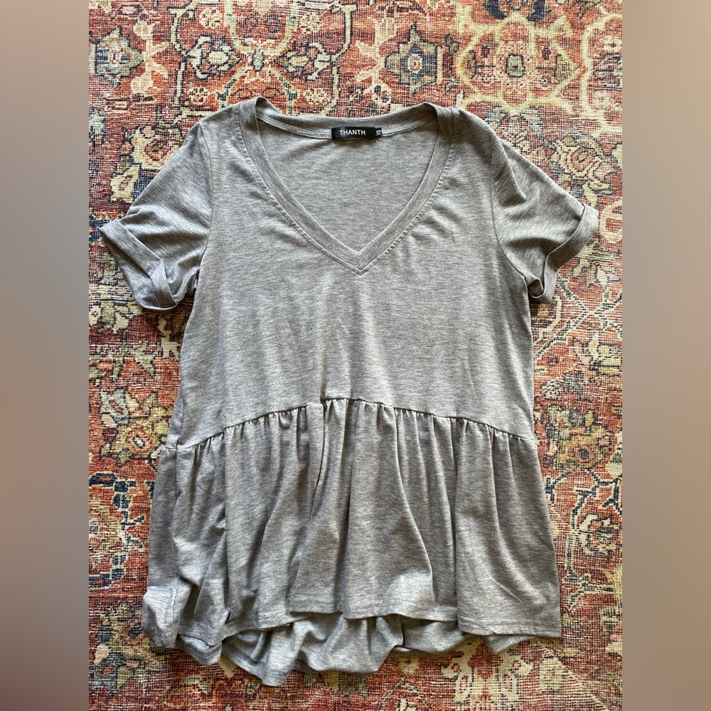 Pretty shirt. Like new.